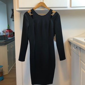 REDUCED!!! Alluring black dress by Neimann Marcus